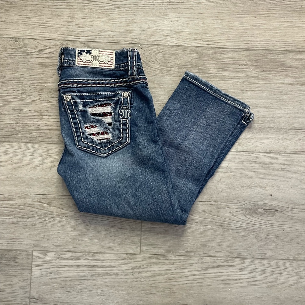 Distressed Blue Jeans